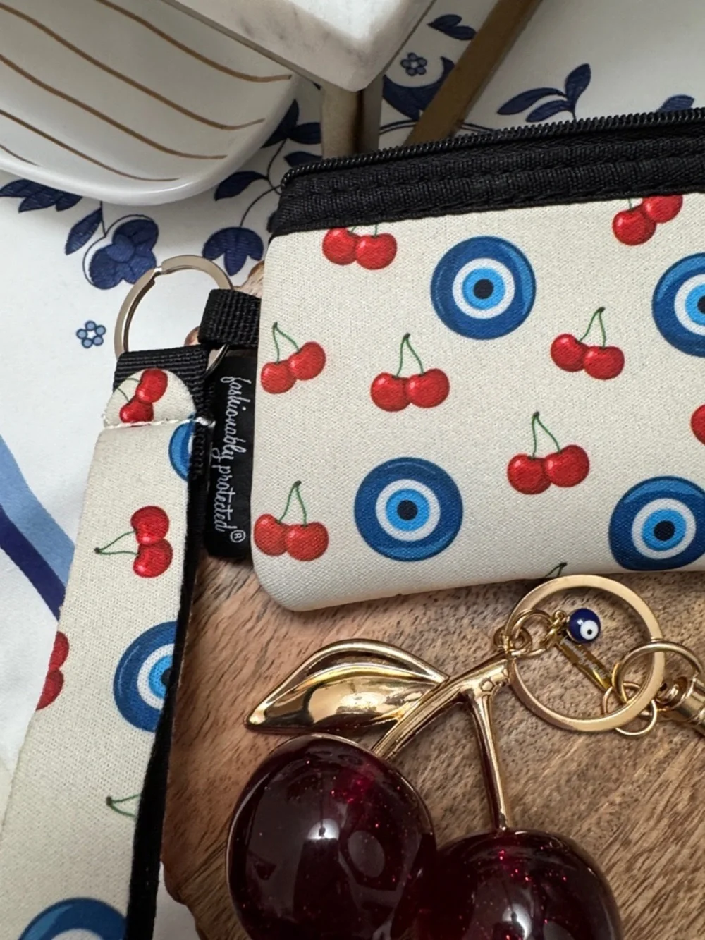 Fashionably Protected Cherry & Evil Eye Wristlet Pouch – Cream - Picture 4 of 9
